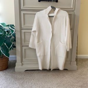 Very pretty white coat.